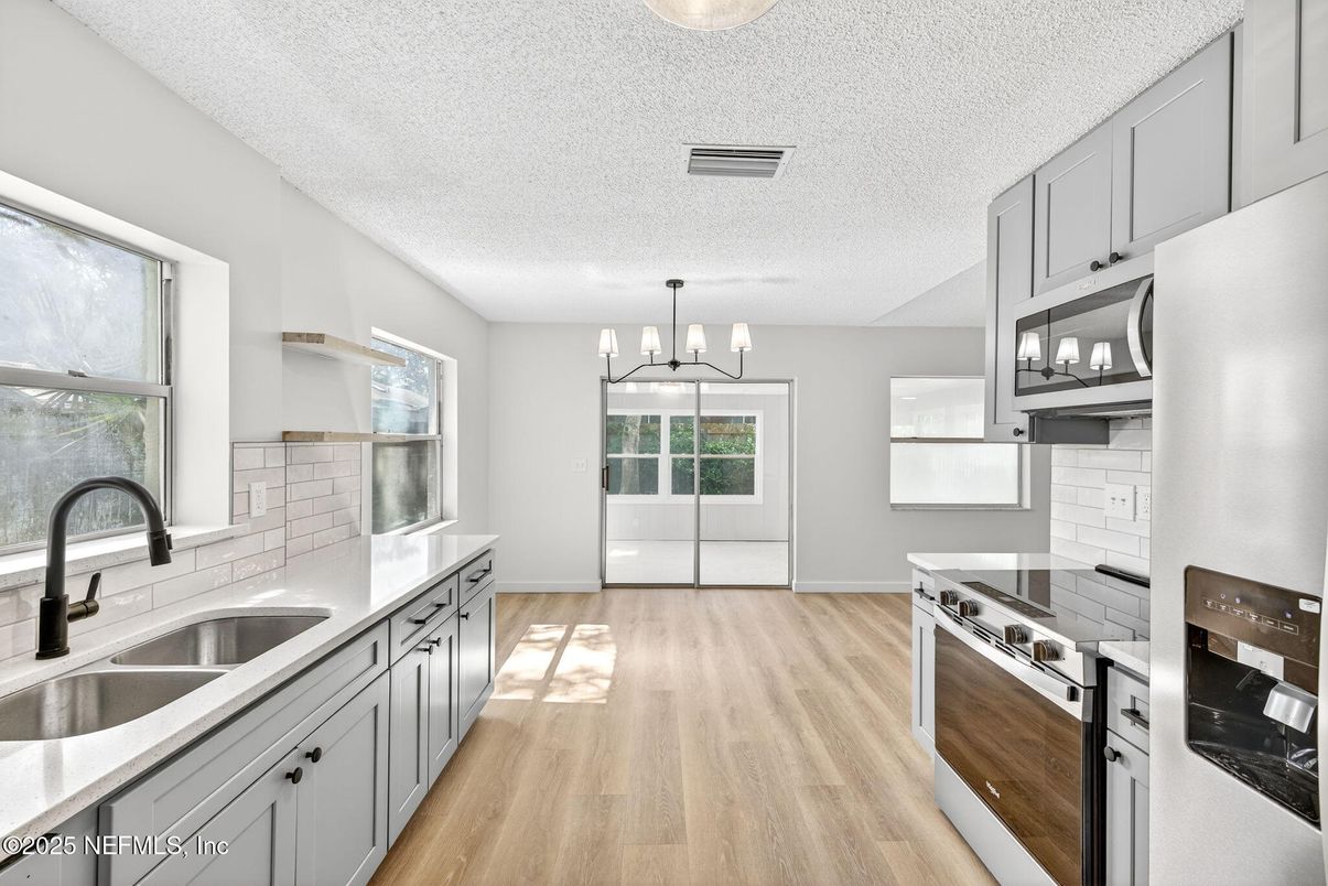 Interior, Kitchen, Pendant Lights, Stainless Steel Appliances, Wood Texture Flooring