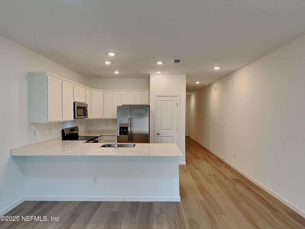 Interior, Kitchen, Recessed Lighting, Stainless Steel Appliances, Wood Texture Flooring