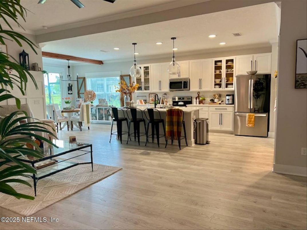 Dining room, Interior, Kitchen, Pendant Lights, Recessed Lighting, Stainless Steel Appliances, Wooden Beams, Wood Texture Flooring