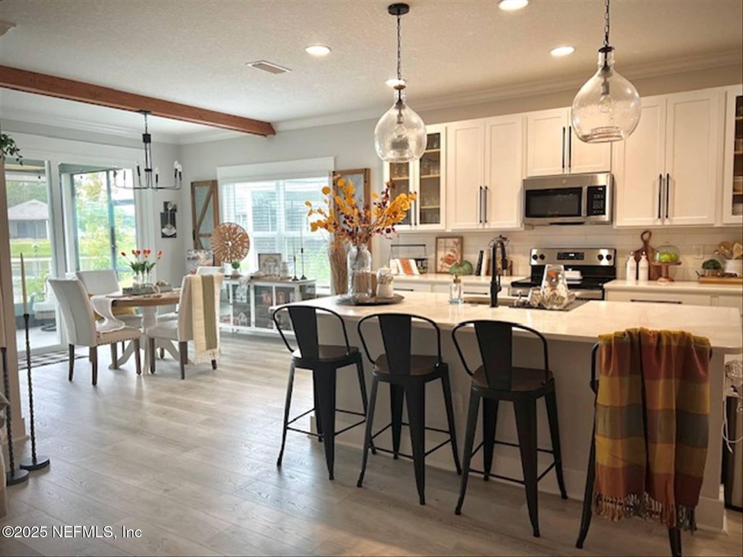 Dining room, Interior, Kitchen, Pendant Lights, Recessed Lighting, Stainless Steel Appliances, Wooden Beams, Wood Texture Flooring
