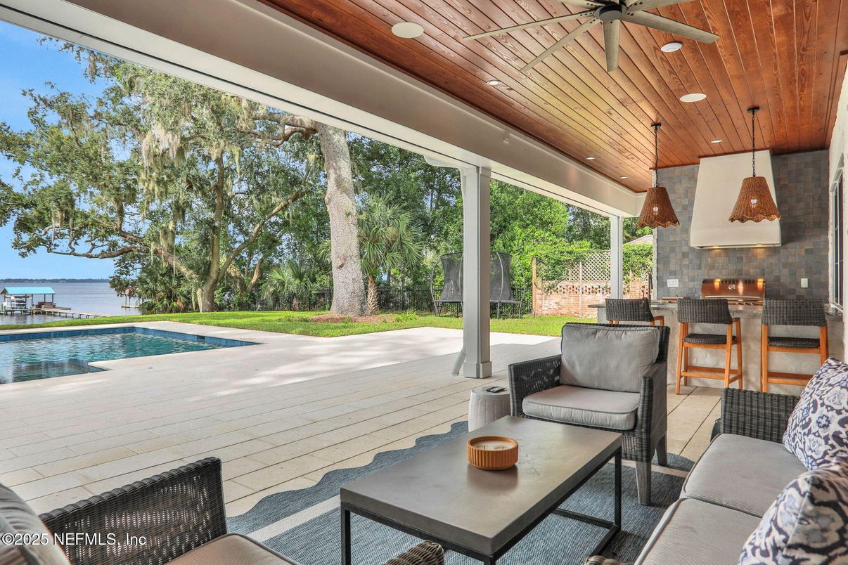 Exterior, Outdoor Kitchen, Pendant Lights, Pool, Water