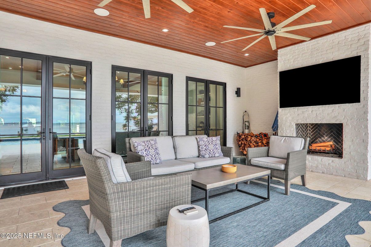 Fireplace, Interior, Living room, Recessed Lighting, Water, Wooden Ceilings
