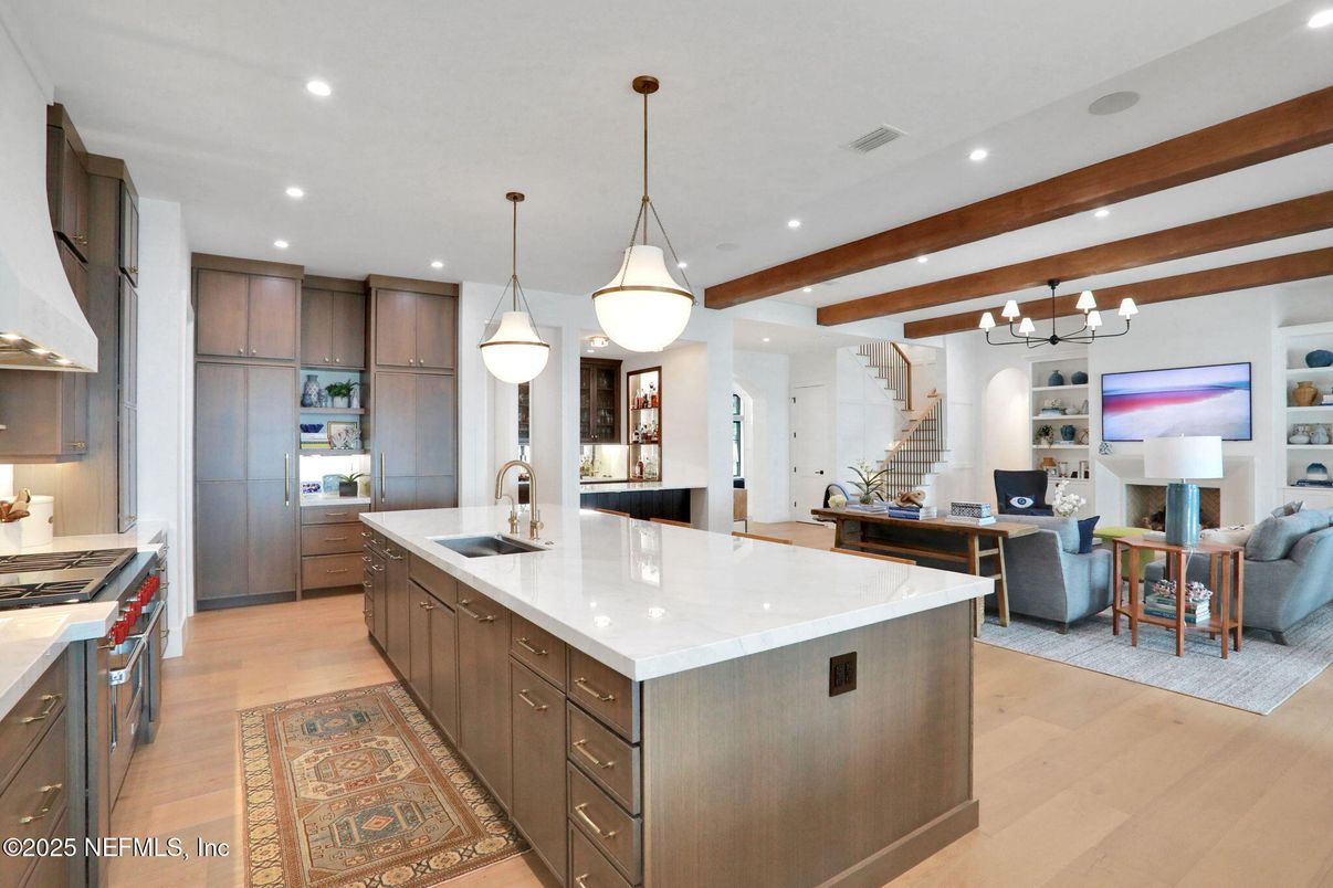 Chandelier, Interior, Kitchen, Living room, Pendant Lights, Recessed Lighting, Stainless Steel Appliances, Wooden Beams, Wood Texture Flooring