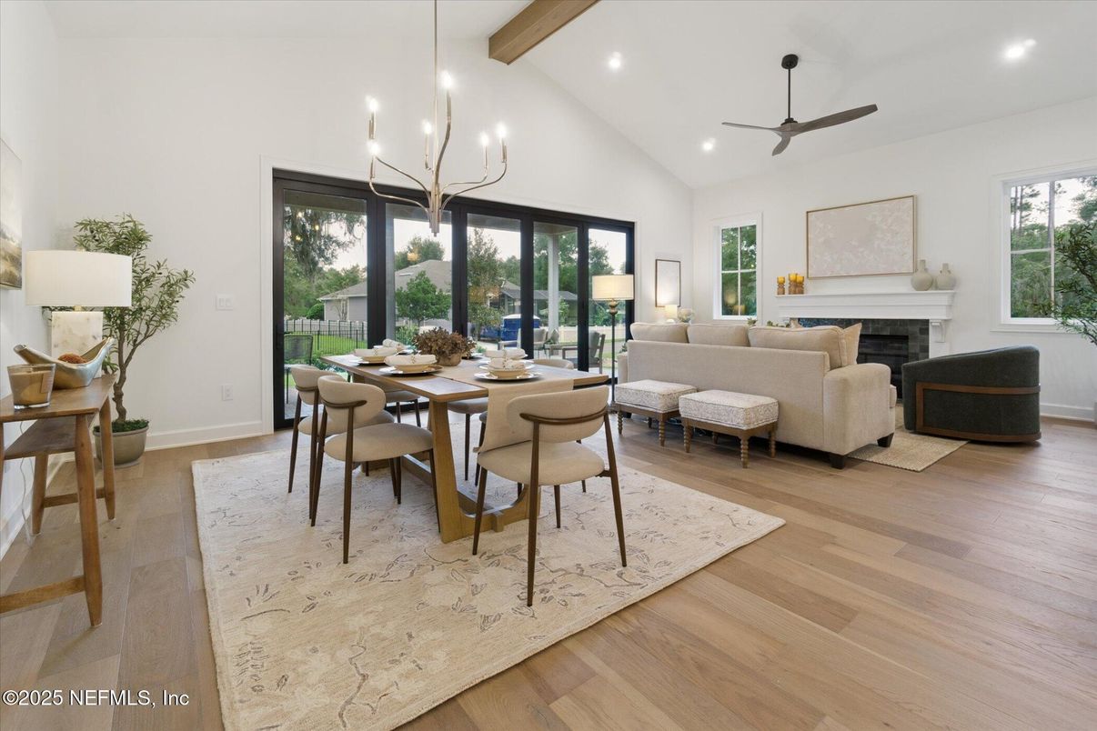 Chandelier, Dining room, Fireplace, Interior, Living room, Pendant Lights, Recessed Lighting, Wooden Beams, Wood Texture Flooring