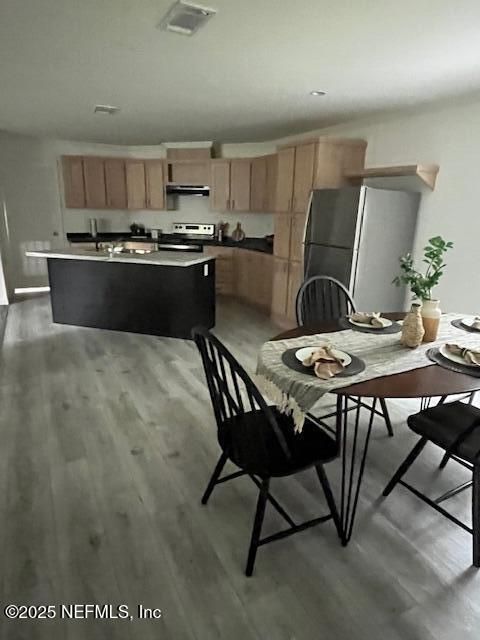 Dining room, Interior, Kitchen, Recessed Lighting, Stainless Steel Appliances, Wood Texture Flooring