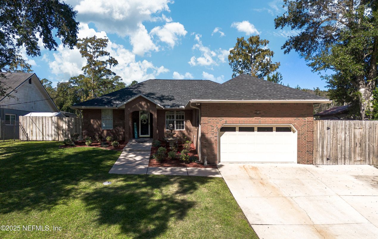 Attached, Backyard, Exterior, Facade, Brick Facade, Ranch