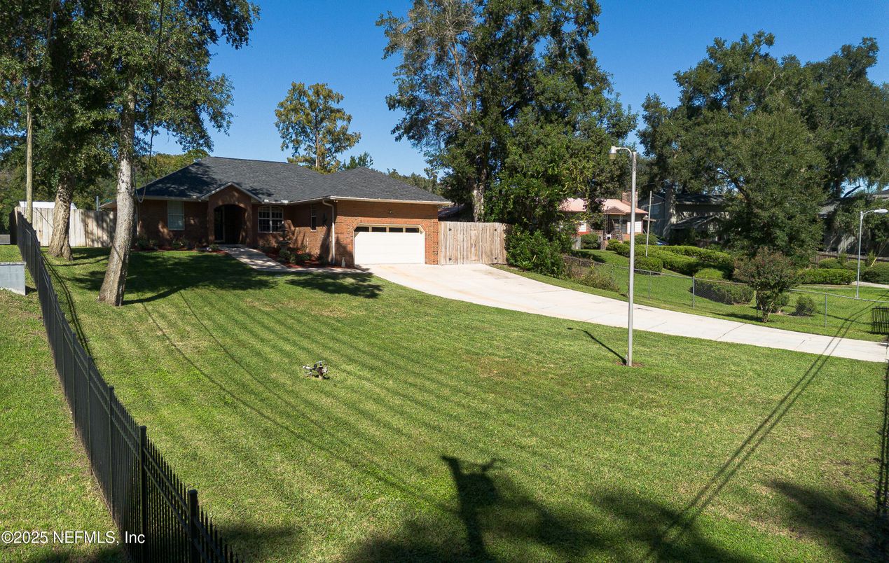 Attached, Backyard, Exterior, Facade, Brick Facade, None