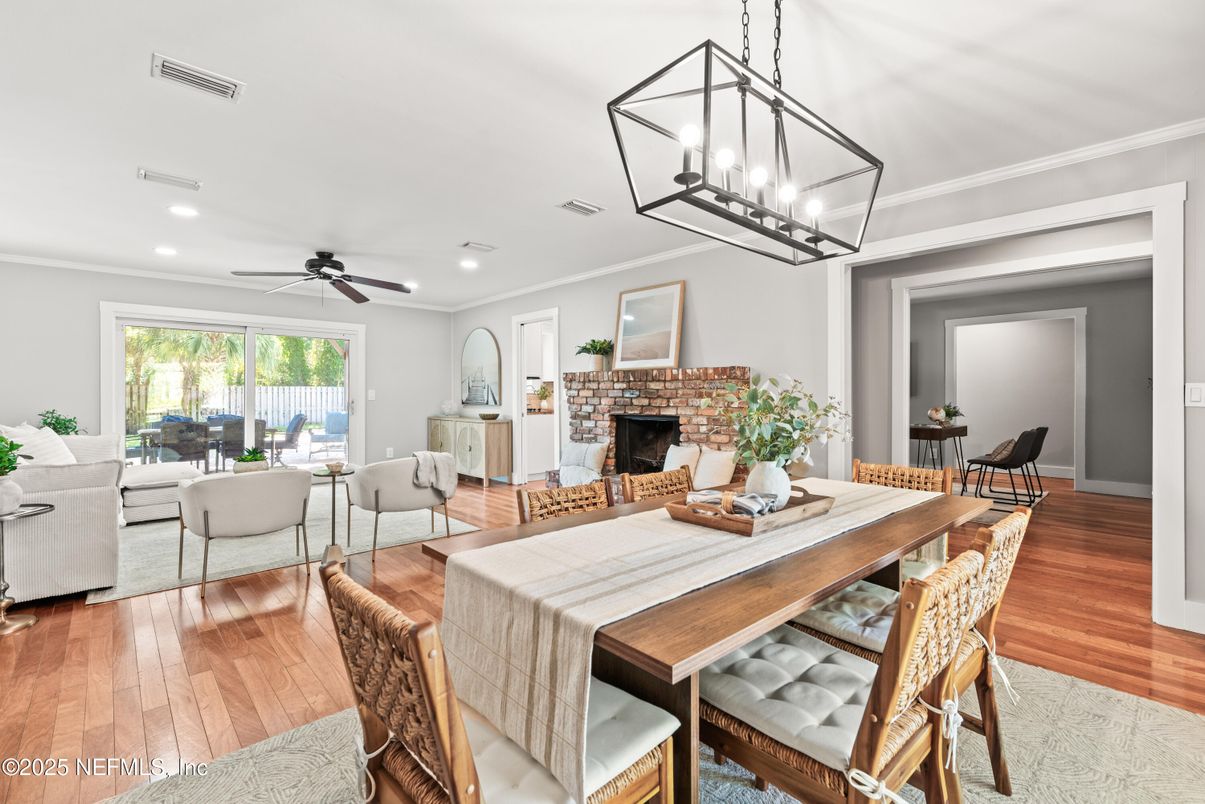 Dining room, Fireplace, Interior, Living room, Pendant Lights, Recessed Lighting, Wood Texture Flooring