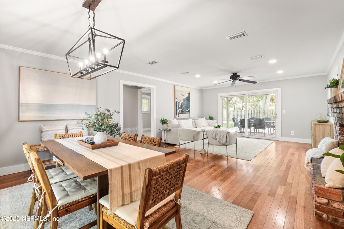 Dining room, Fireplace, Interior, Living room, Pendant Lights, Recessed Lighting, Wood Texture Flooring