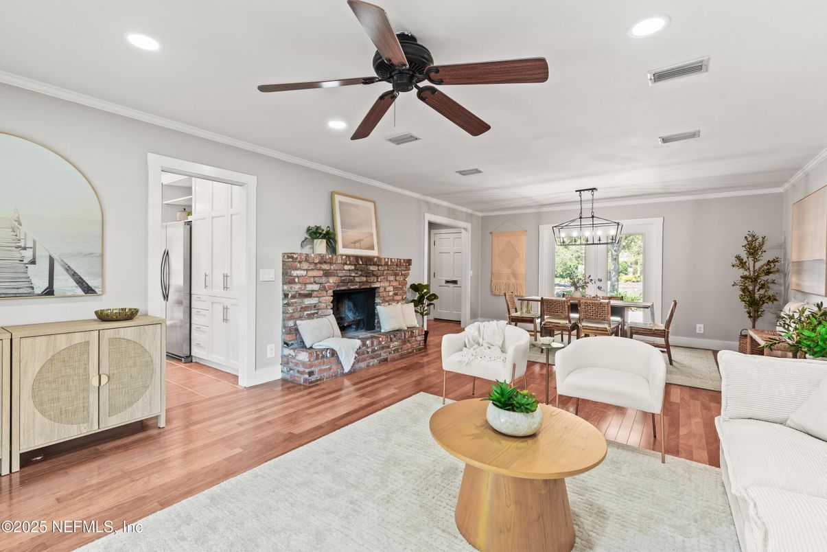 Dining room, Fireplace, Interior, Living room, Pendant Lights, Recessed Lighting, Wood Texture Flooring