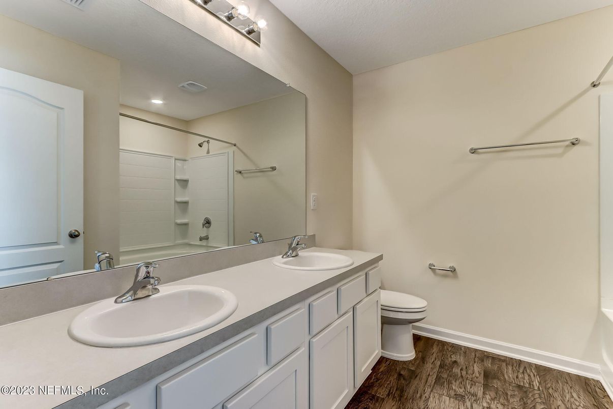 Bathroom, Dual Sink Vanities, Interior, Recessed Lighting, Wood Texture Flooring