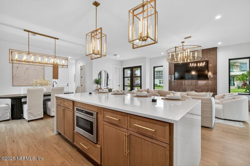 Chandelier, Dining room, Interior, Kitchen, Living room, Pendant Lights, Recessed Lighting, Wood Texture Flooring