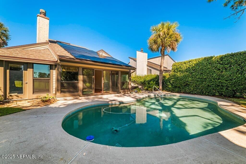 Exterior, Pool, Solar Panels