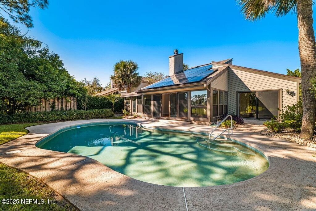 Exterior, Pool, Solar Panels