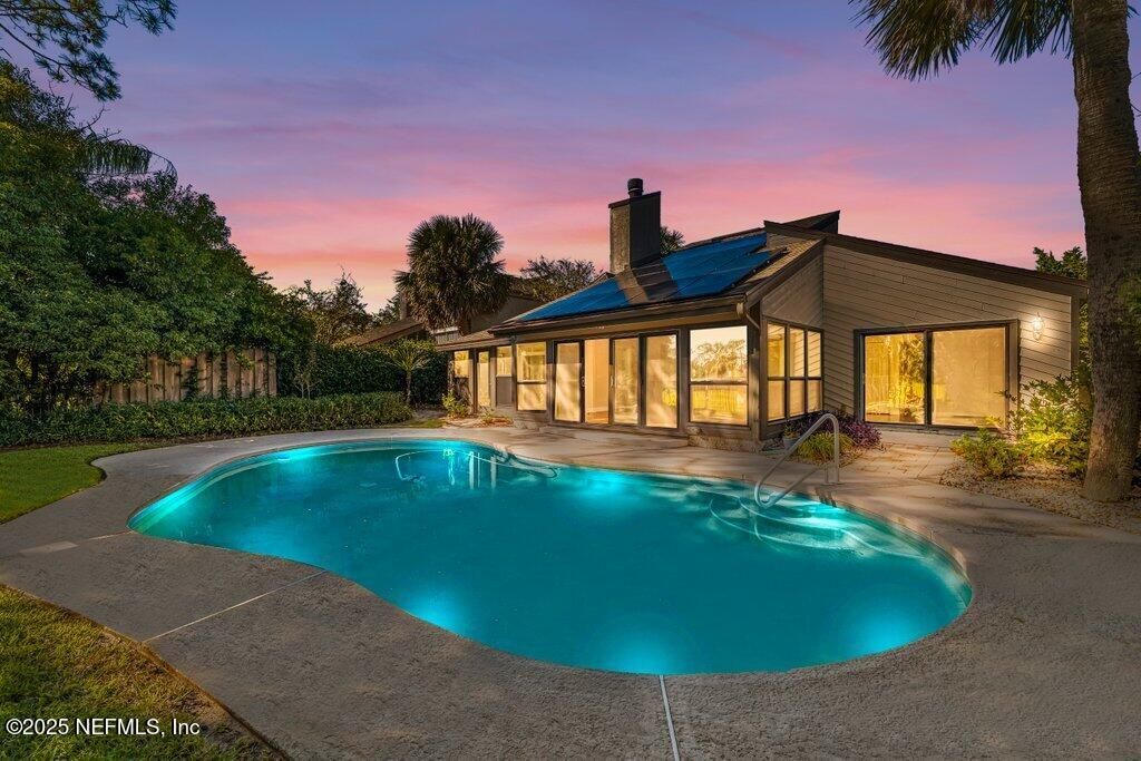 Exterior, Pool, Solar Panels