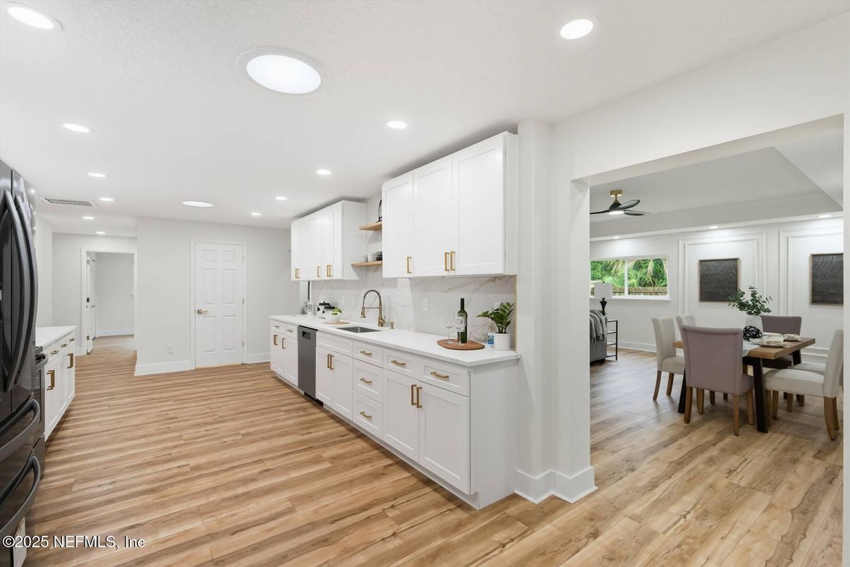 Dining room, Interior, Kitchen, Recessed Lighting, Stainless Steel Appliances, Wood Texture Flooring