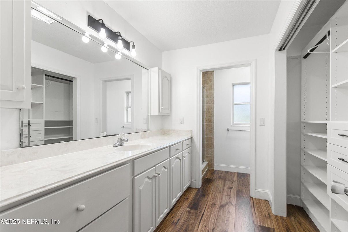 Bathroom, Dual Sink Vanities, Interior, Walk-in Closets, Wood Texture Flooring