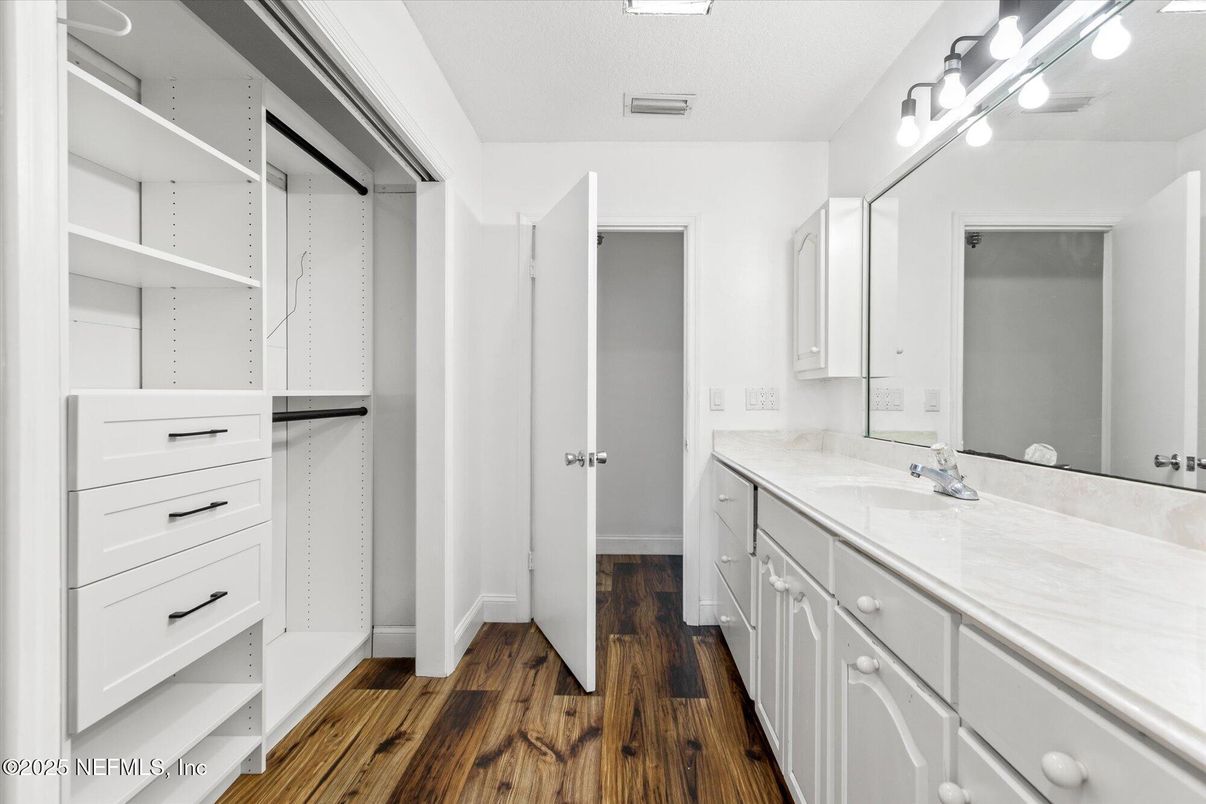 Bathroom, Dual Sink Vanities, Interior, Walk-in Closets, Wood Texture Flooring