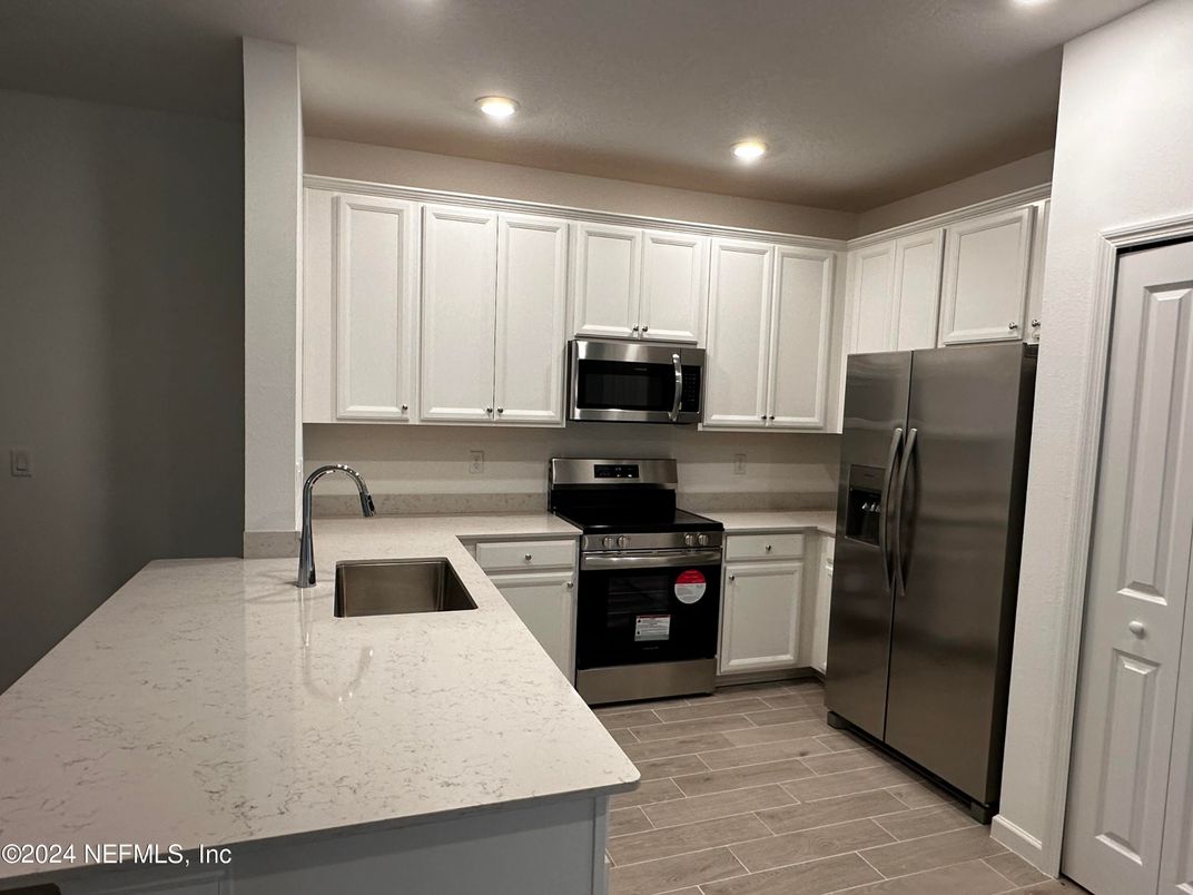 Interior, Kitchen, Recessed Lighting, Stainless Steel Appliances, Wood Texture Flooring