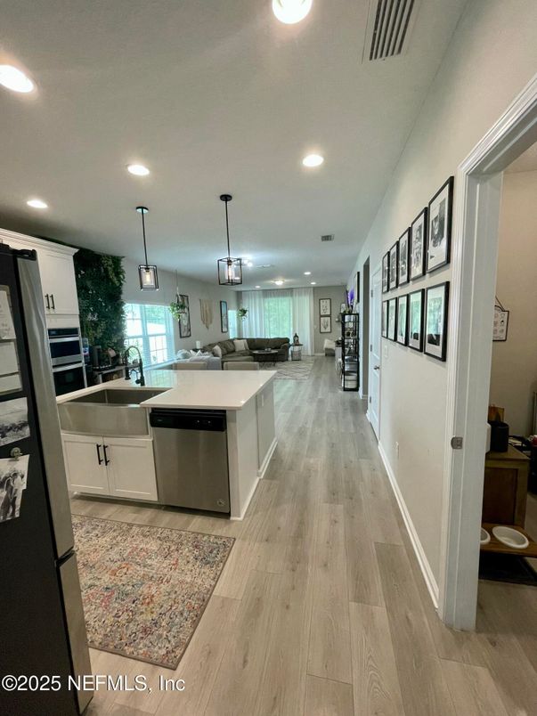 Interior, Kitchen, Pendant Lights, Recessed Lighting, Stainless Steel Appliances, Wood Texture Flooring