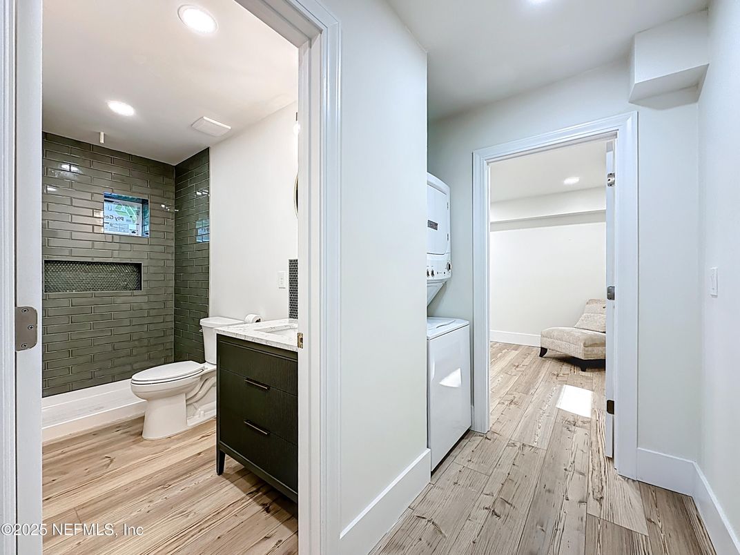 Bathroom, Interior, Recessed Lighting, Washer, Wood Texture Flooring