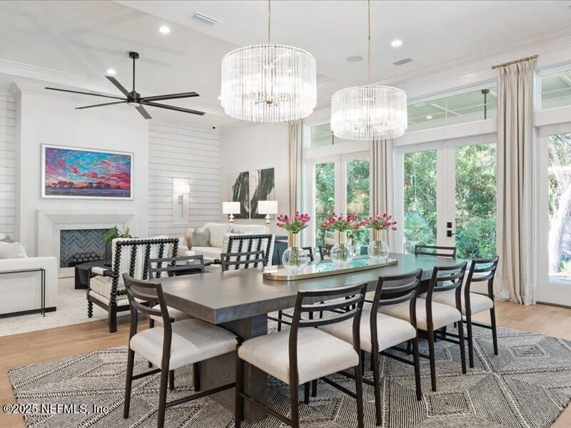 Chandelier, Dining room, Fireplace, Interior, Living room, Recessed Lighting, Wood Texture Flooring