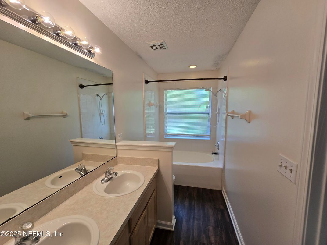 Bathroom, Dual Sink Vanities, Interior, Recessed Lighting, Wood Texture Flooring