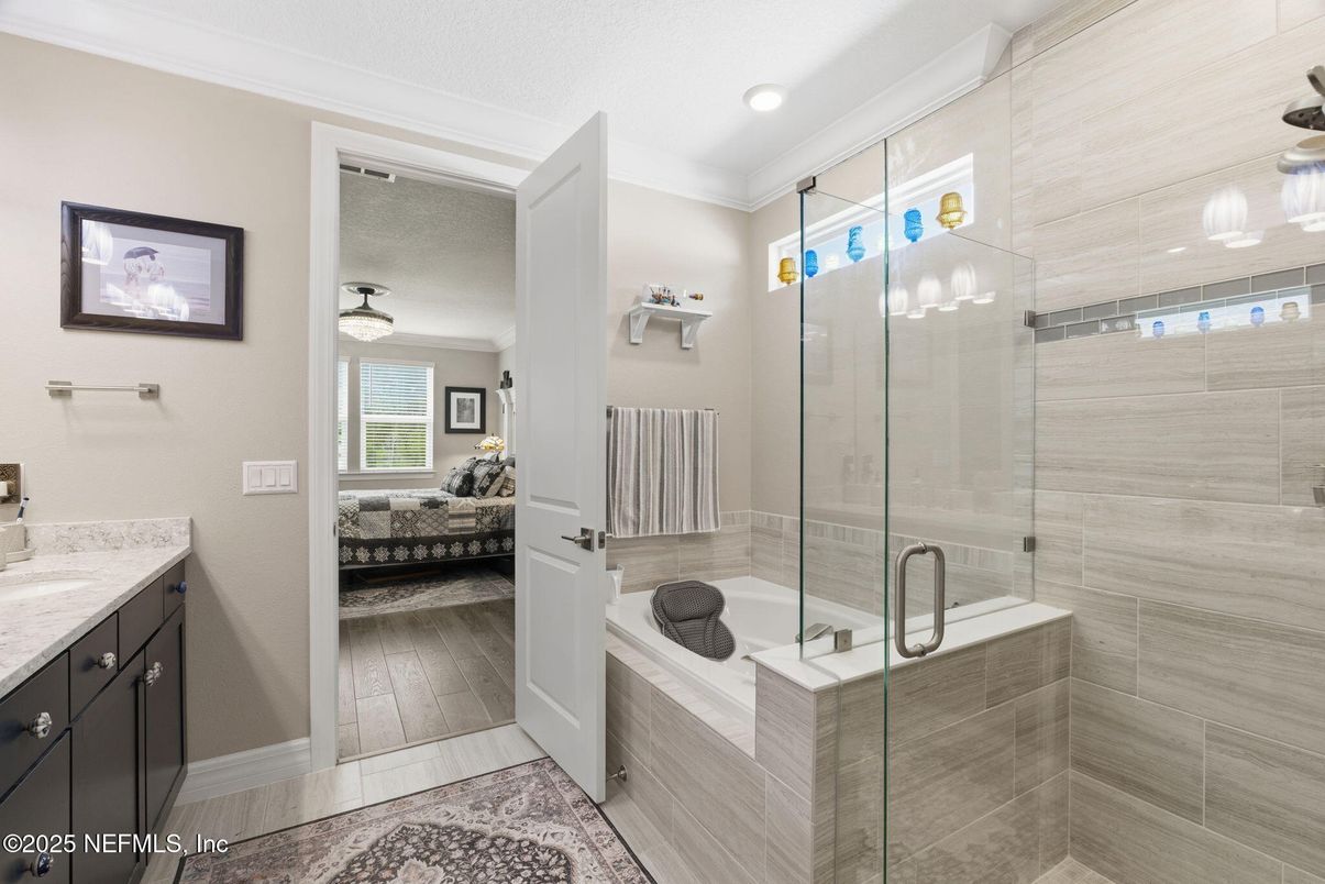 Bathroom, Bedroom, Glass Shower, Interior, Recessed Lighting, Wood Texture Flooring