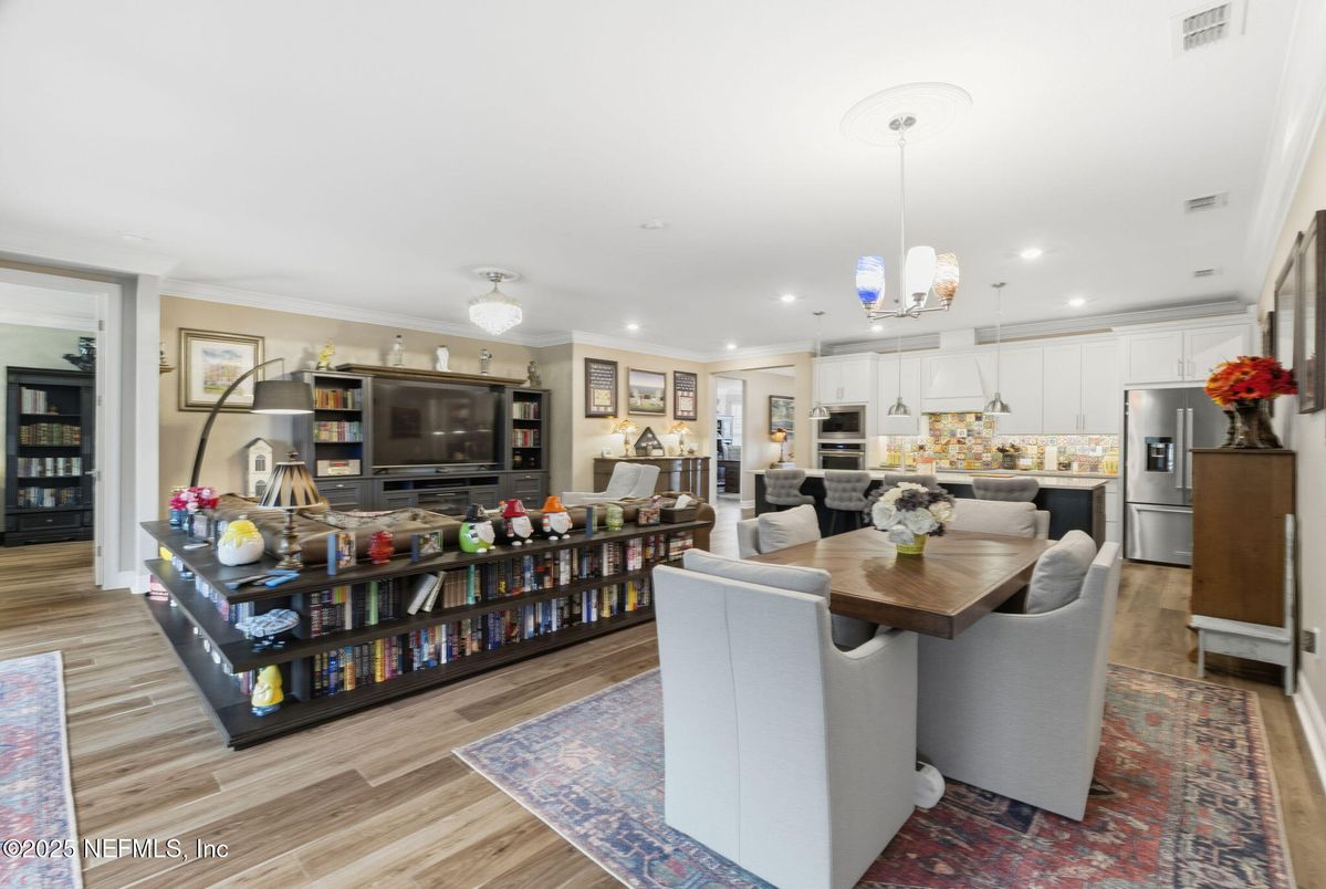 Dining room, Interior, Kitchen, Living room, Pendant Lights, Recessed Lighting, Stainless Steel Appliances, Wood Texture Flooring