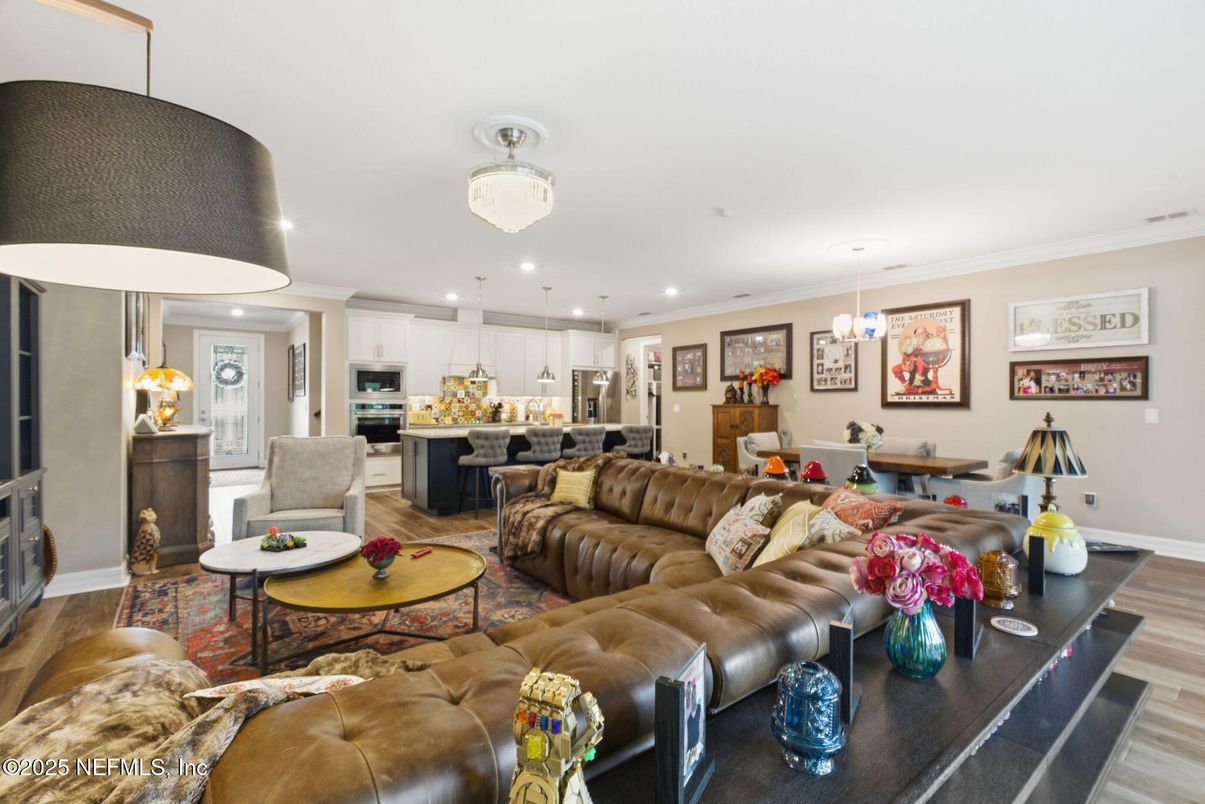 Dining room, Interior, Kitchen, Living room, Pendant Lights, Recessed Lighting, Stainless Steel Appliances, Wood Texture Flooring