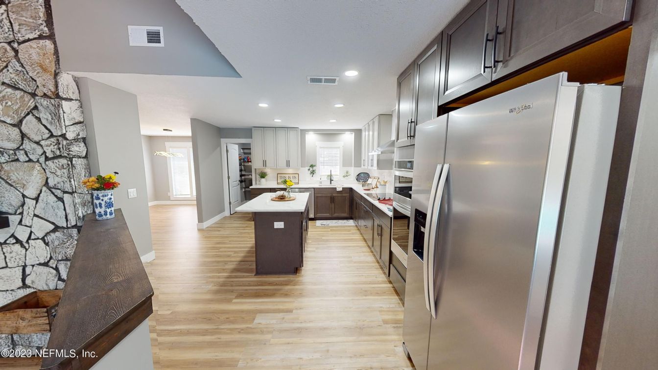 Interior, Kitchen, Recessed Lighting, Stainless Steel Appliances, Stone Walls, Wood Texture Flooring