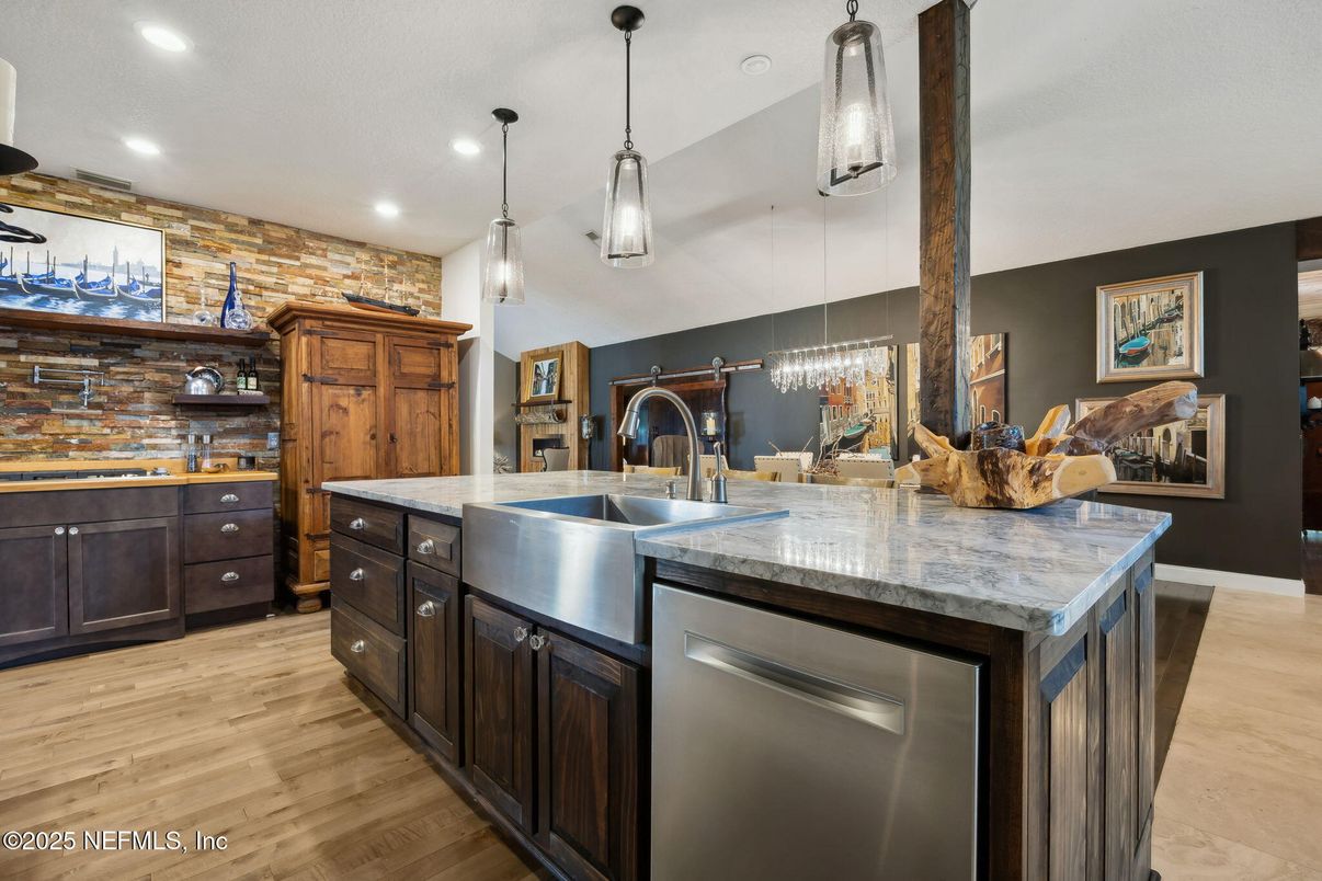 Chandelier, Interior, Kitchen, Pendant Lights, Recessed Lighting, Stainless Steel Appliances, Stone Walls, Wood Texture Flooring