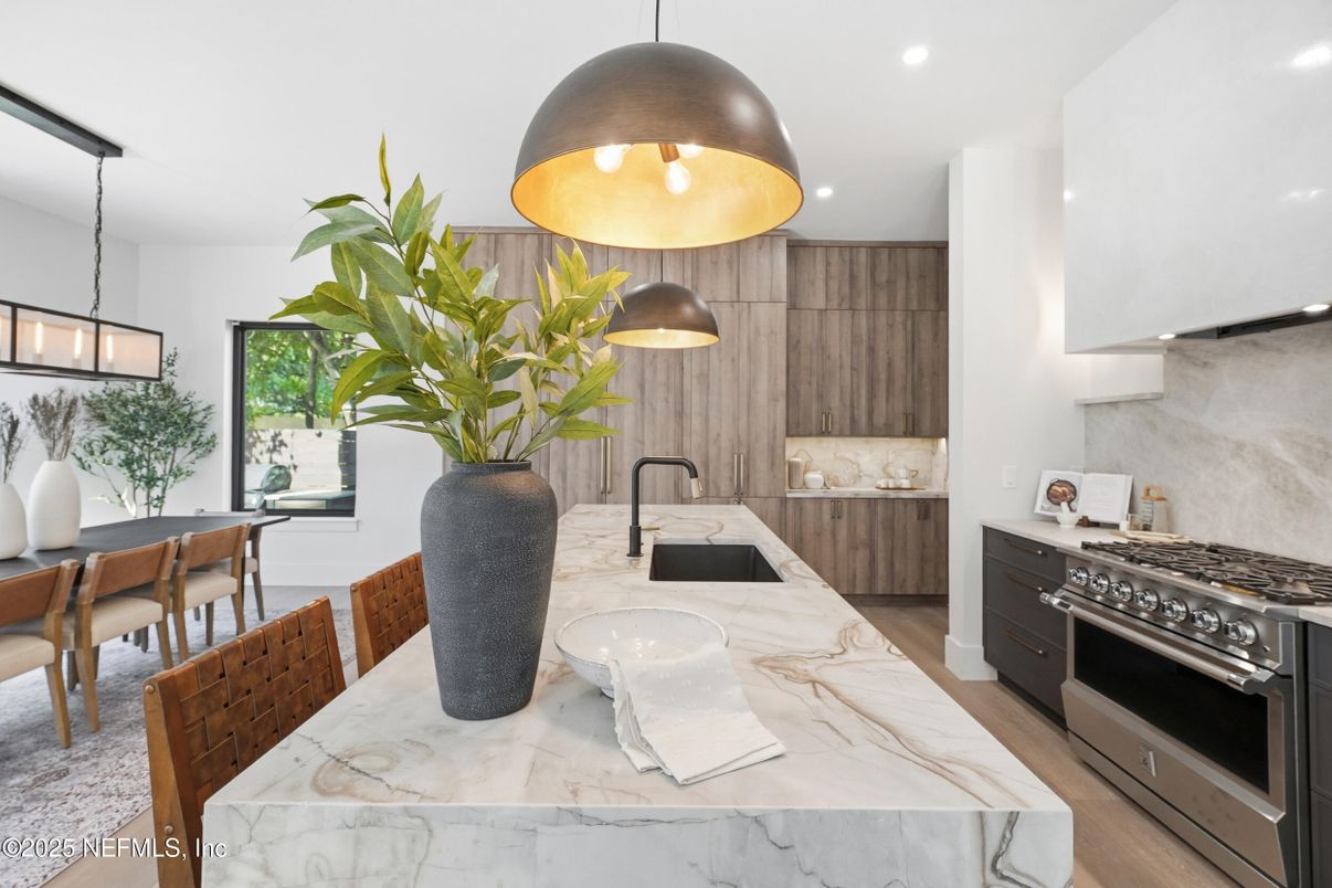 Dining room, Interior, Kitchen, Pendant Lights, Recessed Lighting, Stainless Steel Appliances, Wood Texture Flooring
