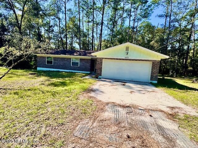 Attached, Backyard, Exterior, Facade, Brick Facade, Ranch