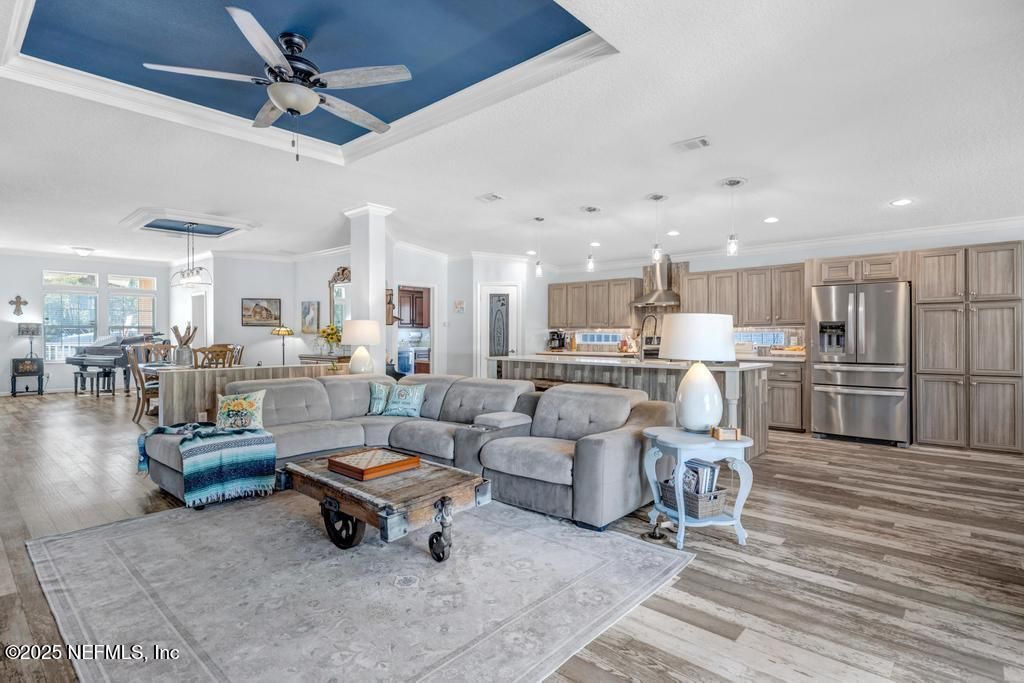 Dining room, Interior, Kitchen, Living room, Pendant Lights, Recessed Lighting, Stainless Steel Appliances, Wood Texture Flooring