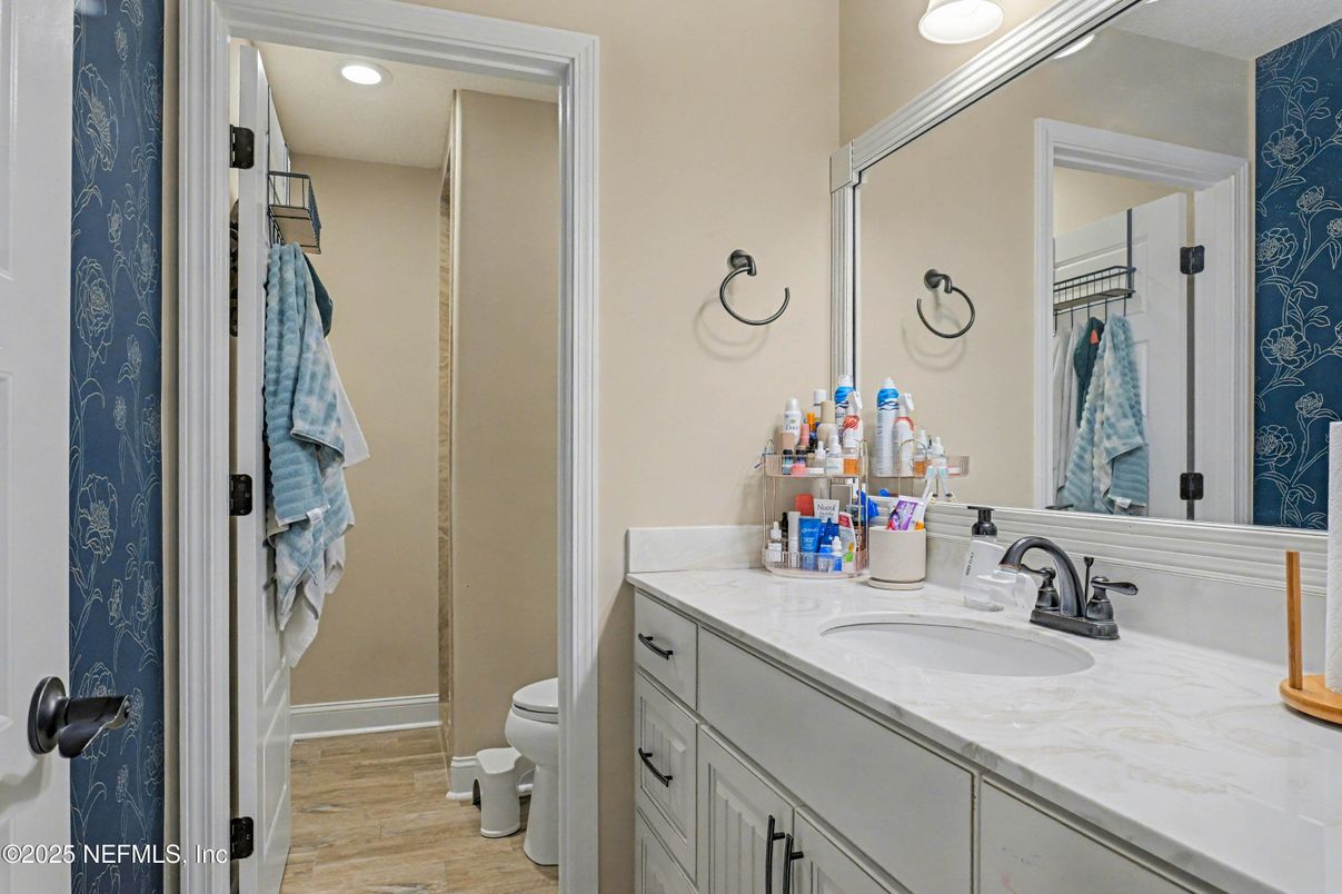 Bathroom, Dual Sink Vanities, Interior, Recessed Lighting, Wood Texture Flooring