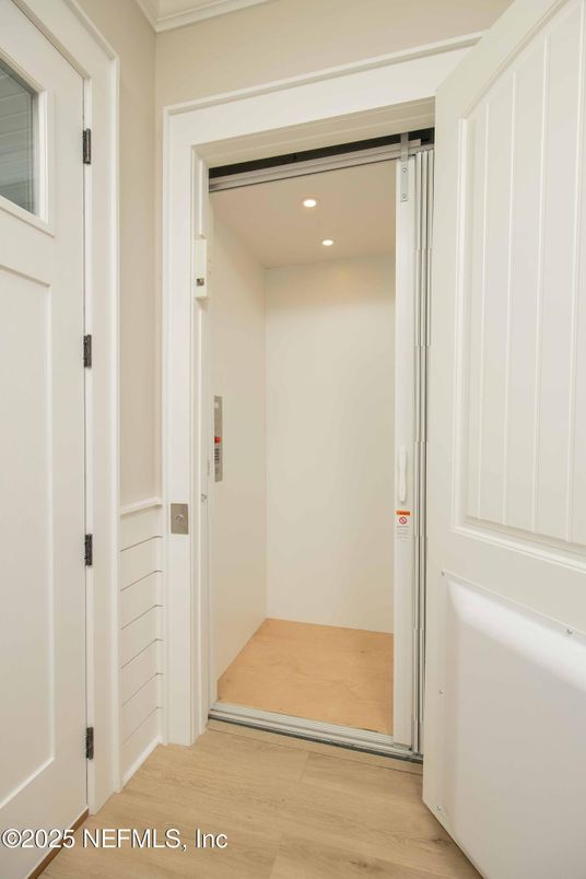 Elevator, Interior, Recessed Lighting, Wood Texture Flooring