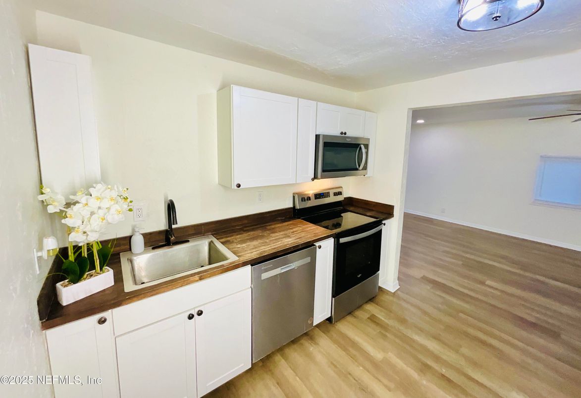 Interior, Kitchen, Stainless Steel Appliances, Wood Texture Flooring