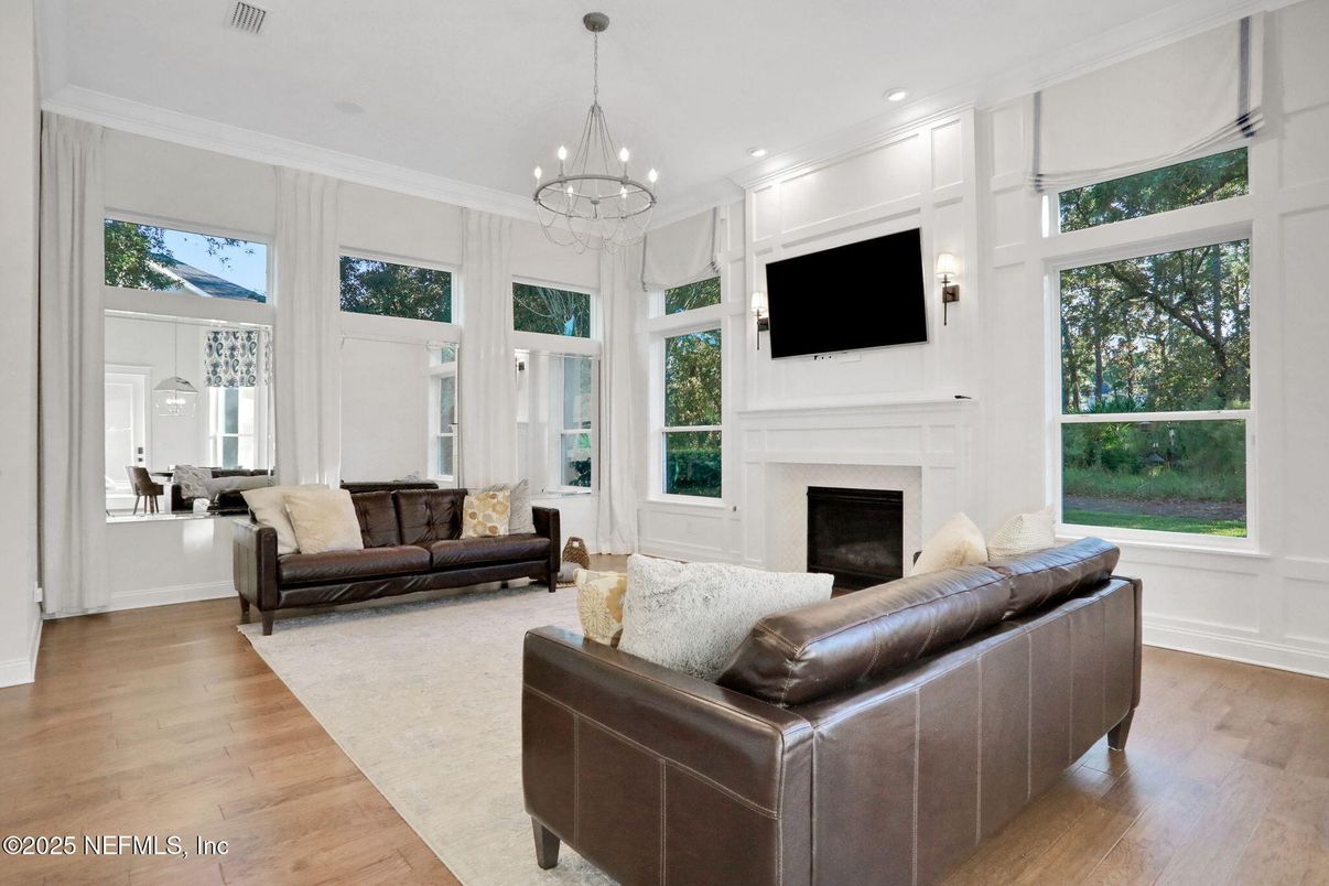 Chandelier, Fireplace, Interior, Living room, Recessed Lighting, Wood Texture Flooring