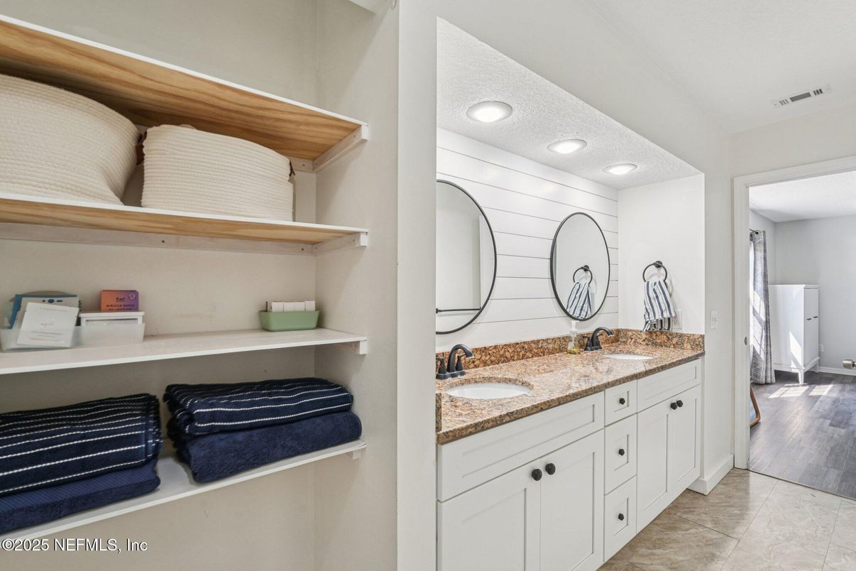 Bathroom, Dual Sink Vanities, Interior, Recessed Lighting, Wood Texture Flooring
