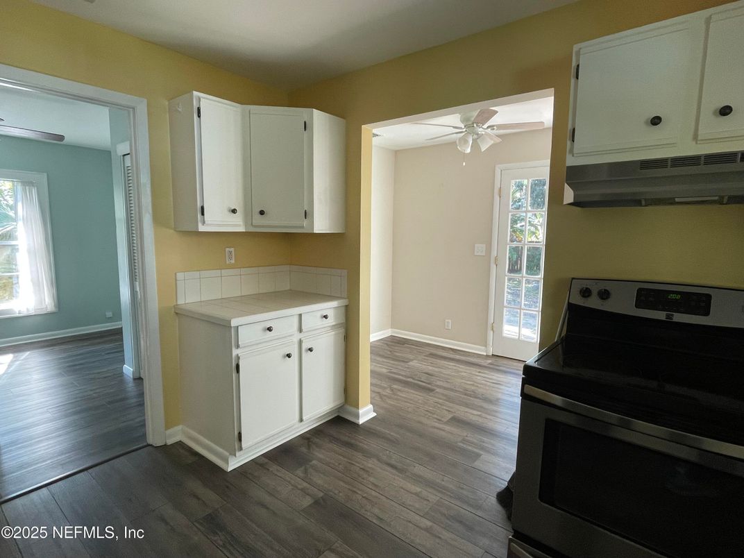 Interior, Kitchen, Tile Countertops, Wood Texture Flooring