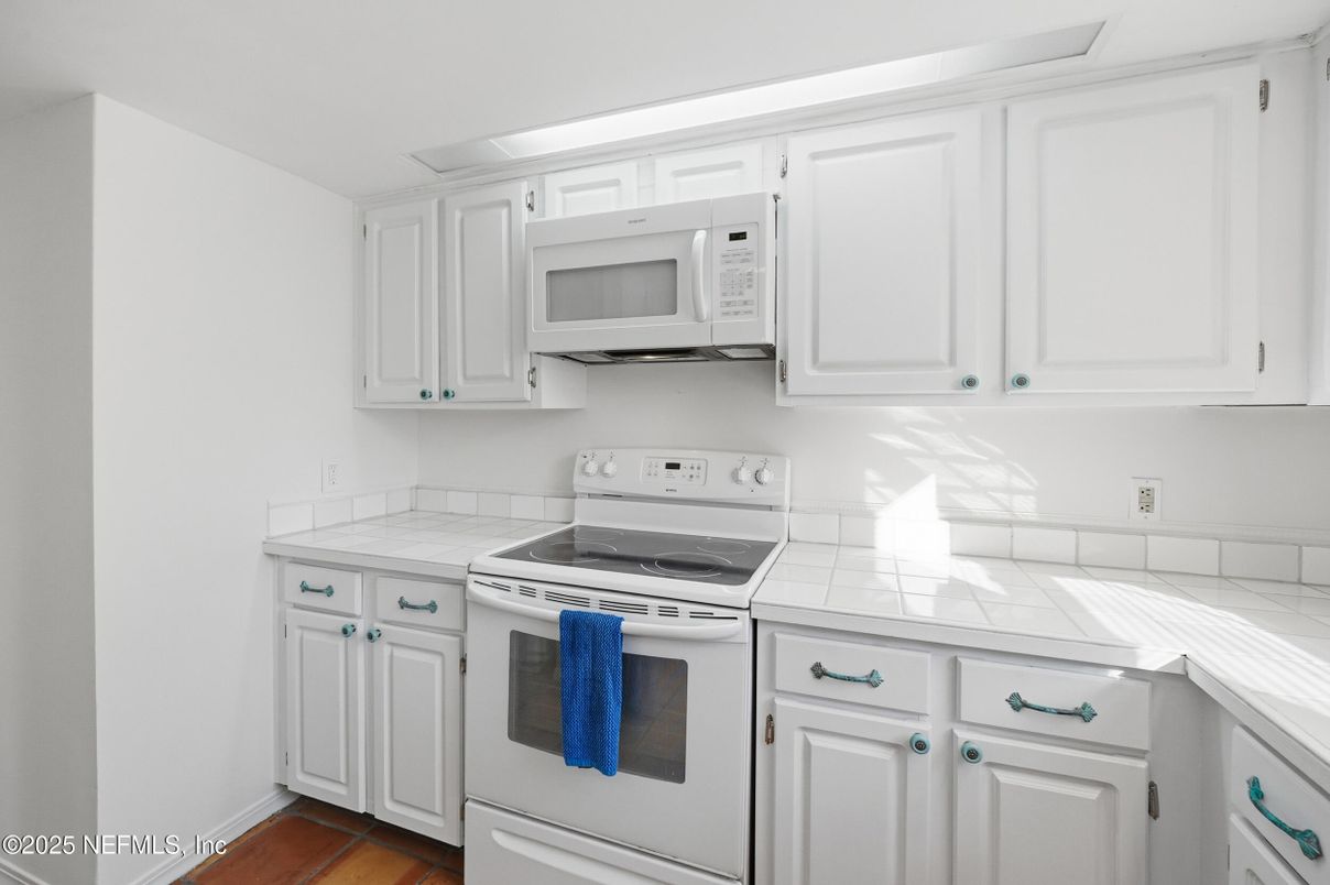 Interior, Kitchen, Tile Countertops, Wood Texture Flooring