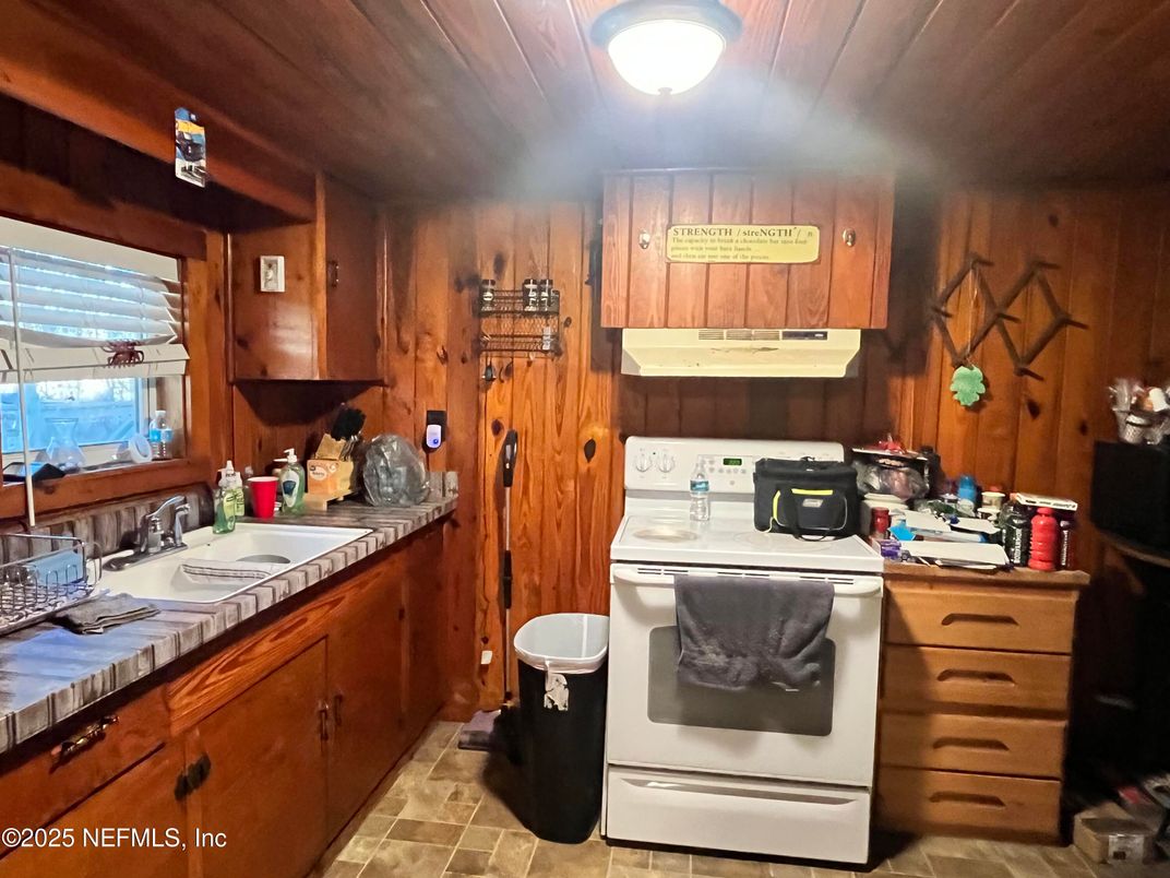 Interior, Kitchen, Tile Countertops, Wooden Walls