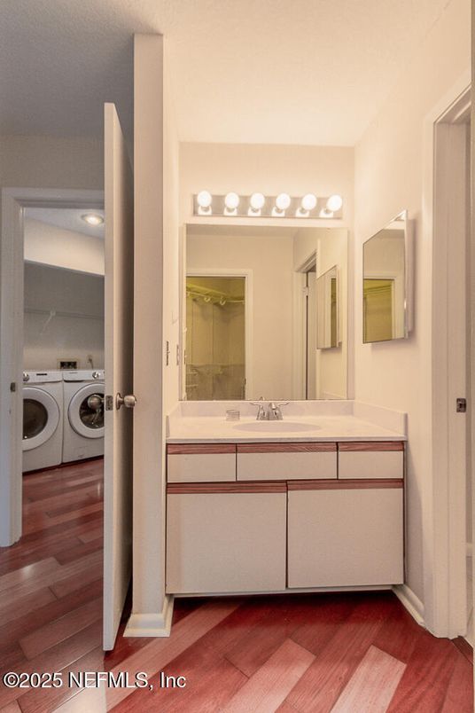 Bathroom, Dual Sink Vanities, Interior, Utility Closets, Washer, Wood Texture Flooring