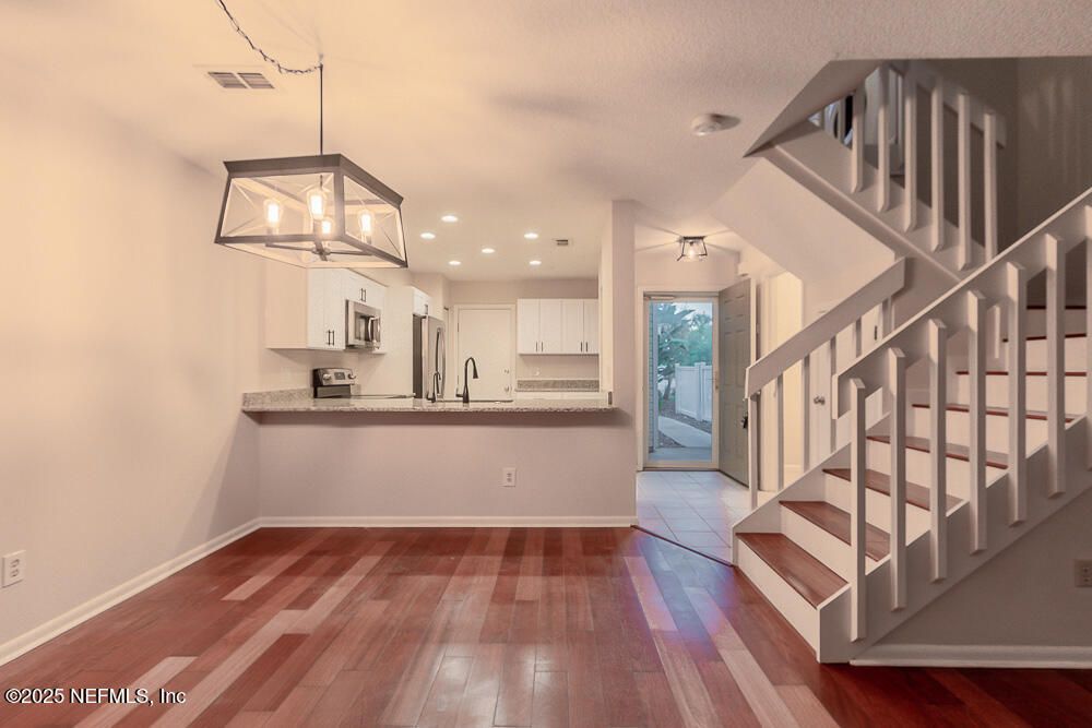 Interior, Kitchen, Pendant Lights, Recessed Lighting, Stainless Steel Appliances, Wood Texture Flooring