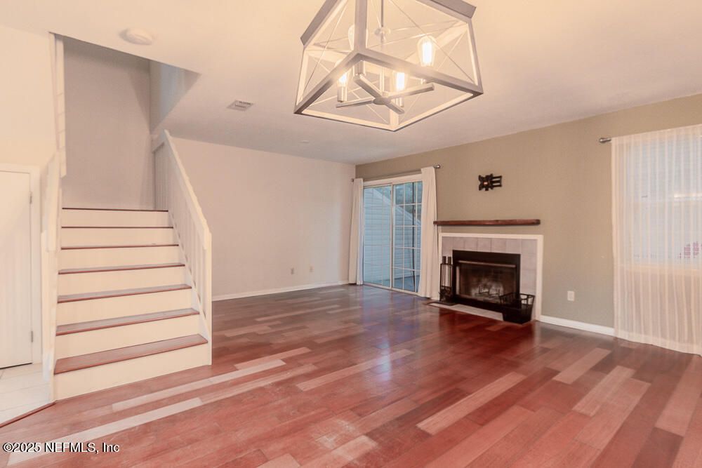 Empty room, Fireplace, Interior, Pendant Lights, Wood Texture Flooring