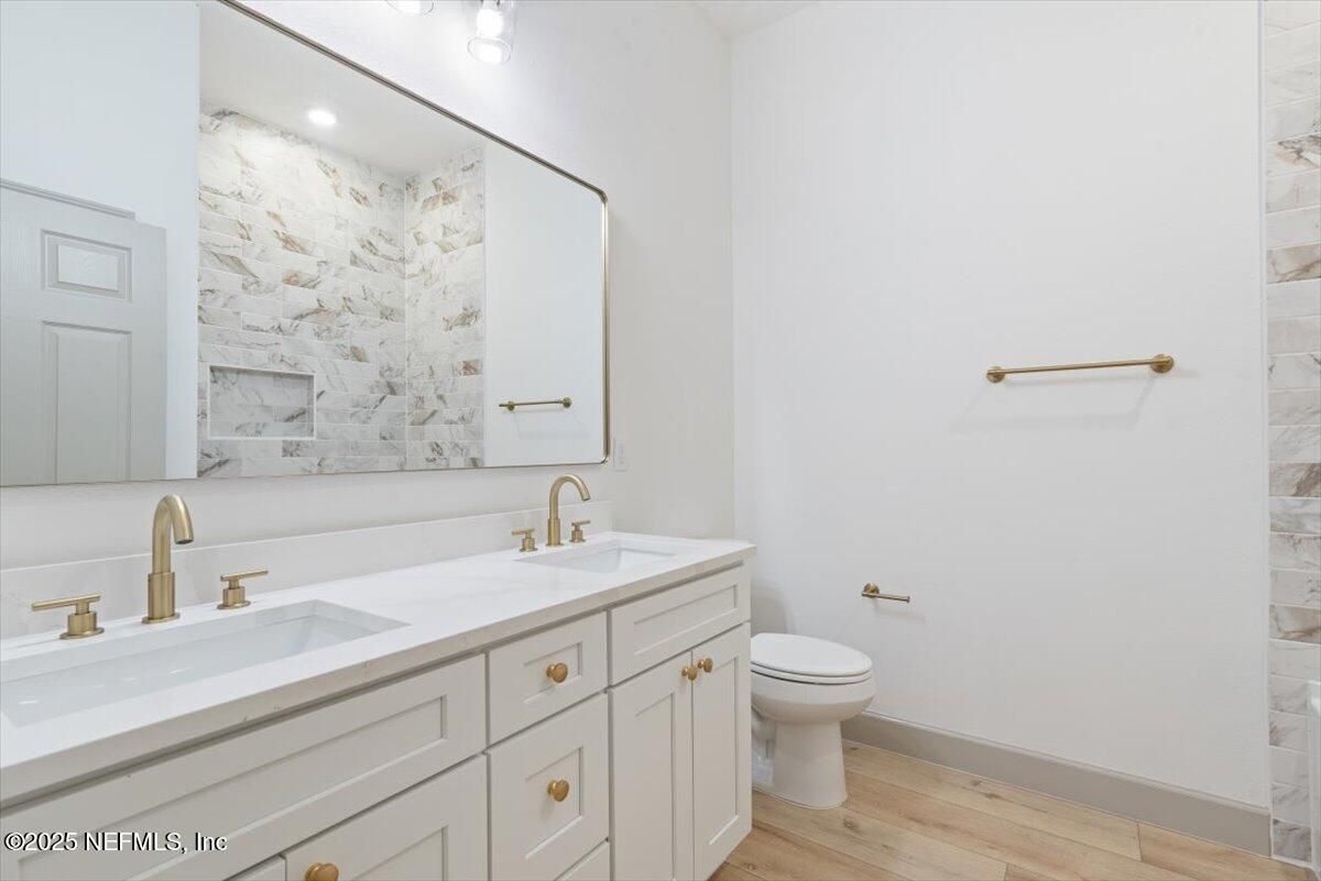 Bathroom, Dual Sink Vanities, Interior, Recessed Lighting, Wood Texture Flooring