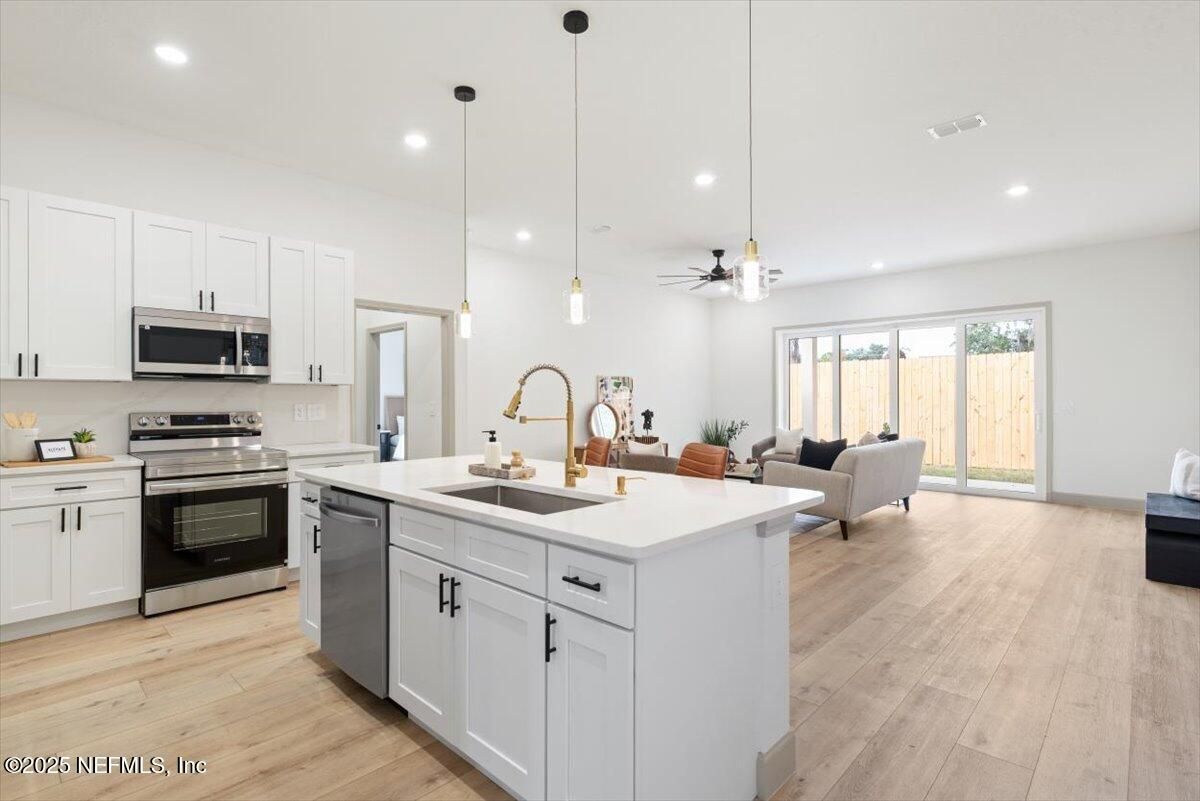 Interior, Kitchen, Living room, Pendant Lights, Recessed Lighting, Stainless Steel Appliances, Wood Texture Flooring