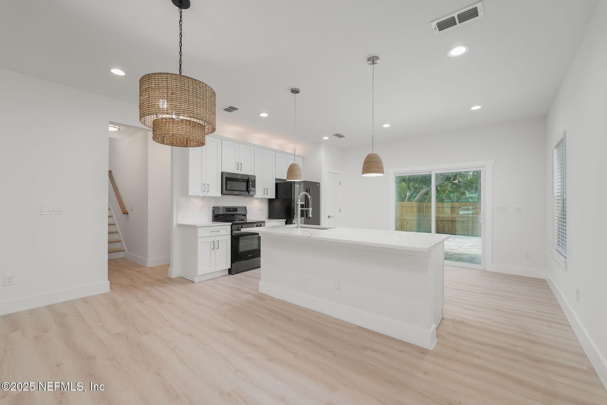Chandelier, Interior, Kitchen, Pendant Lights, Recessed Lighting, Stainless Steel Appliances, Wood Texture Flooring