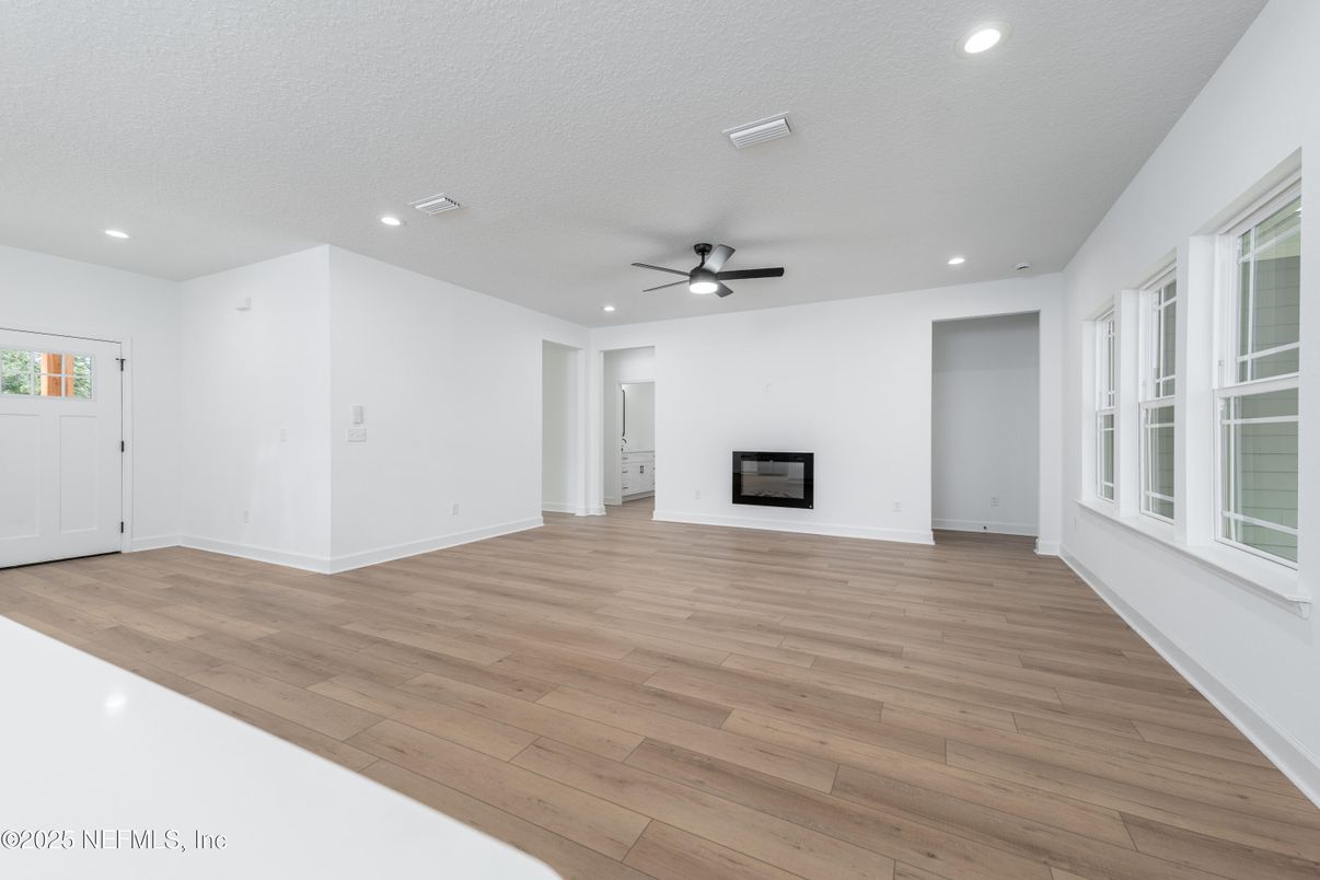 Empty room, Fireplace, Interior, Recessed Lighting, Wood Texture Flooring